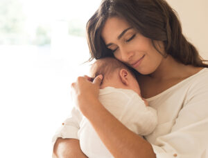 Woman with newborn baby
